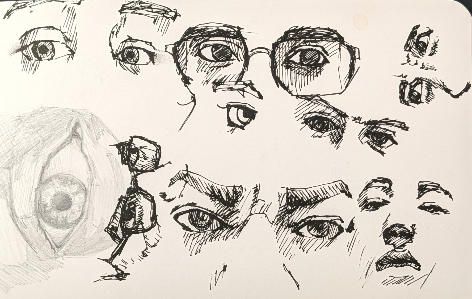 Sketchbook sheet of ink eye studies from different references, drawn with no pencil underdrawing