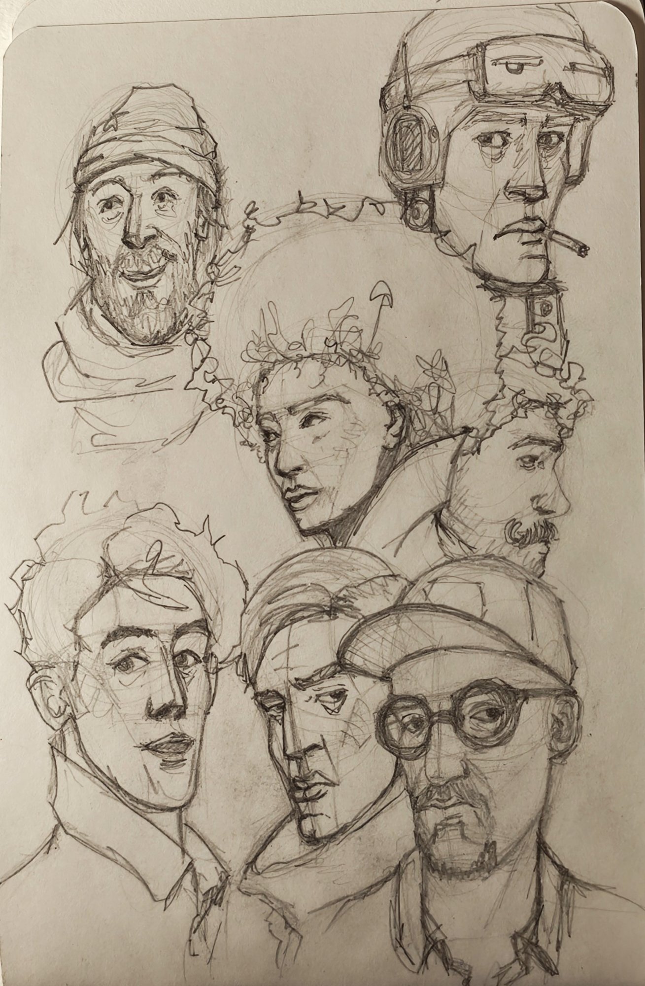 Sketchbook page of seven quick pencil heads, including a bearded man in a cap and a pilot in goggles